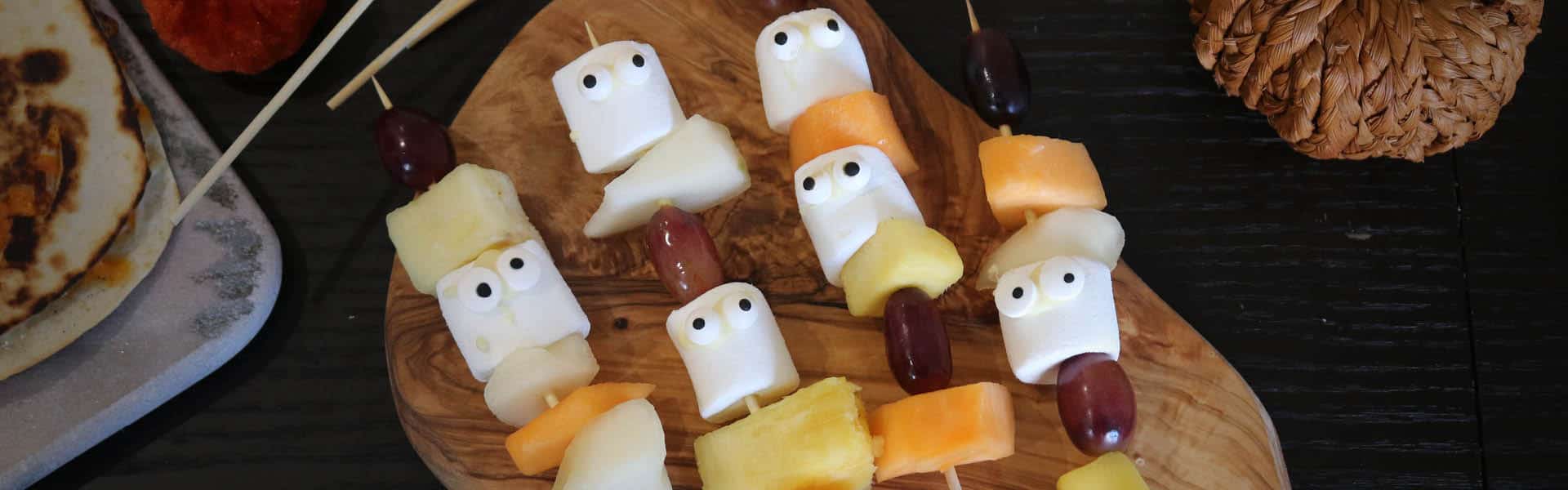 Ghoulish fruit kebabs